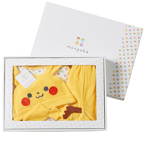 Monpoké 白色波點禮盒，透過透明視窗可見內裡的黃色比卡超套裝。